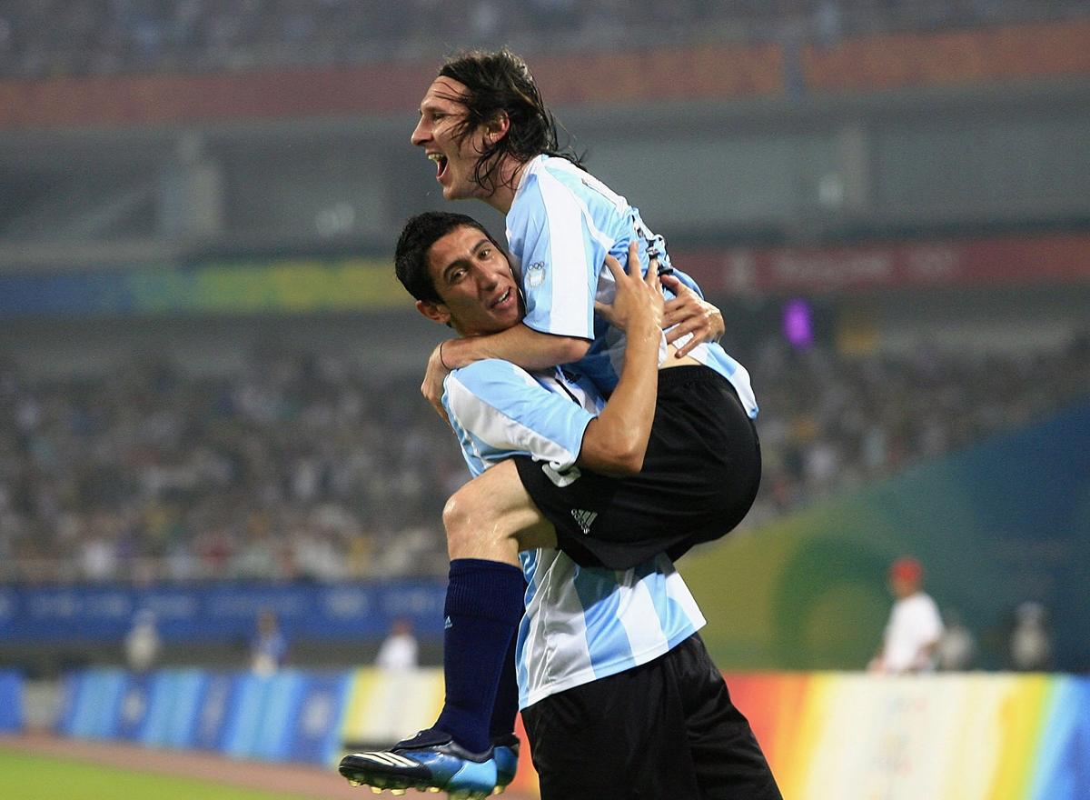 AMIGOS DEL DEPORTE. Ambos tienen un vínculo inquebrantable en la Selección Argentina y otros equipos. / OLYMPICS PEKIN 2008
