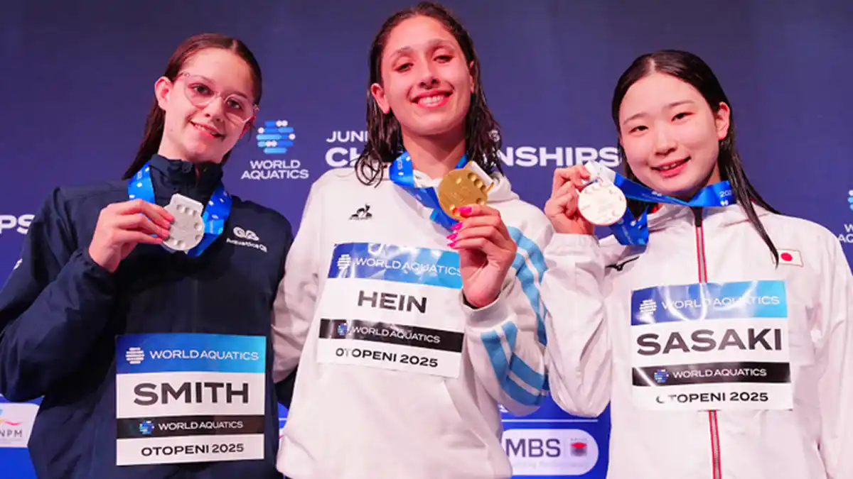 HISTÓRICO. Agostina Hein, en lo mas alto del podio, con su medalla de oro.