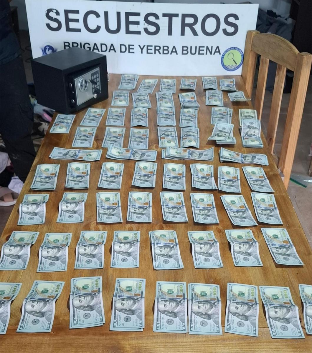 EN EFECTIVO. La Policía secuestró U$S 11.000 del domicilio de la acusada.