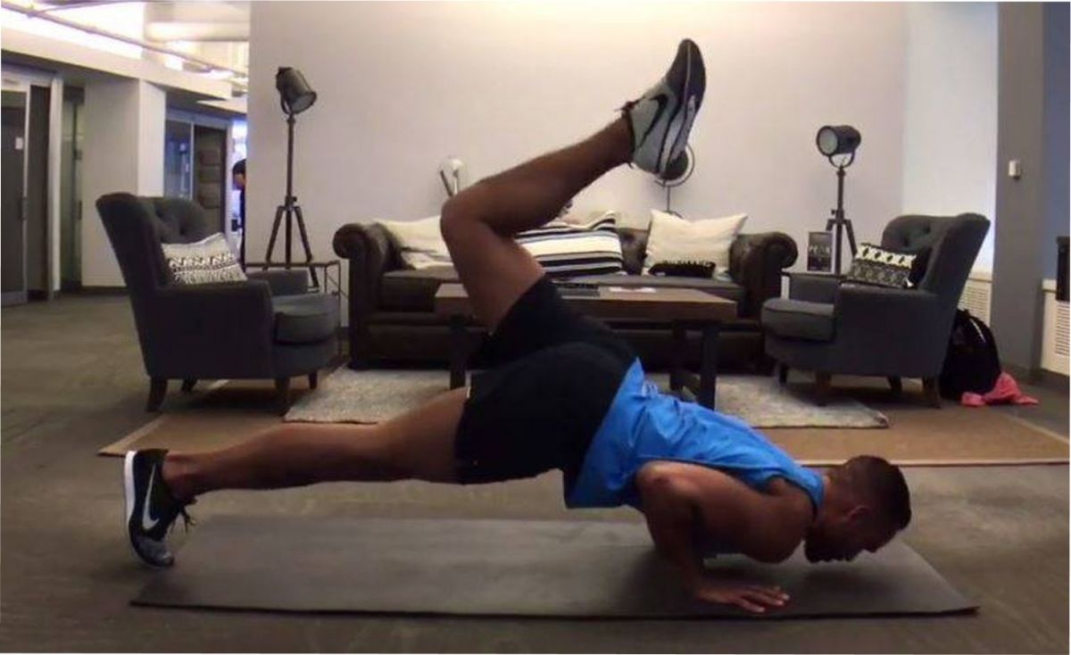 El escorpión, el ejercicio que transforma tu plancha.