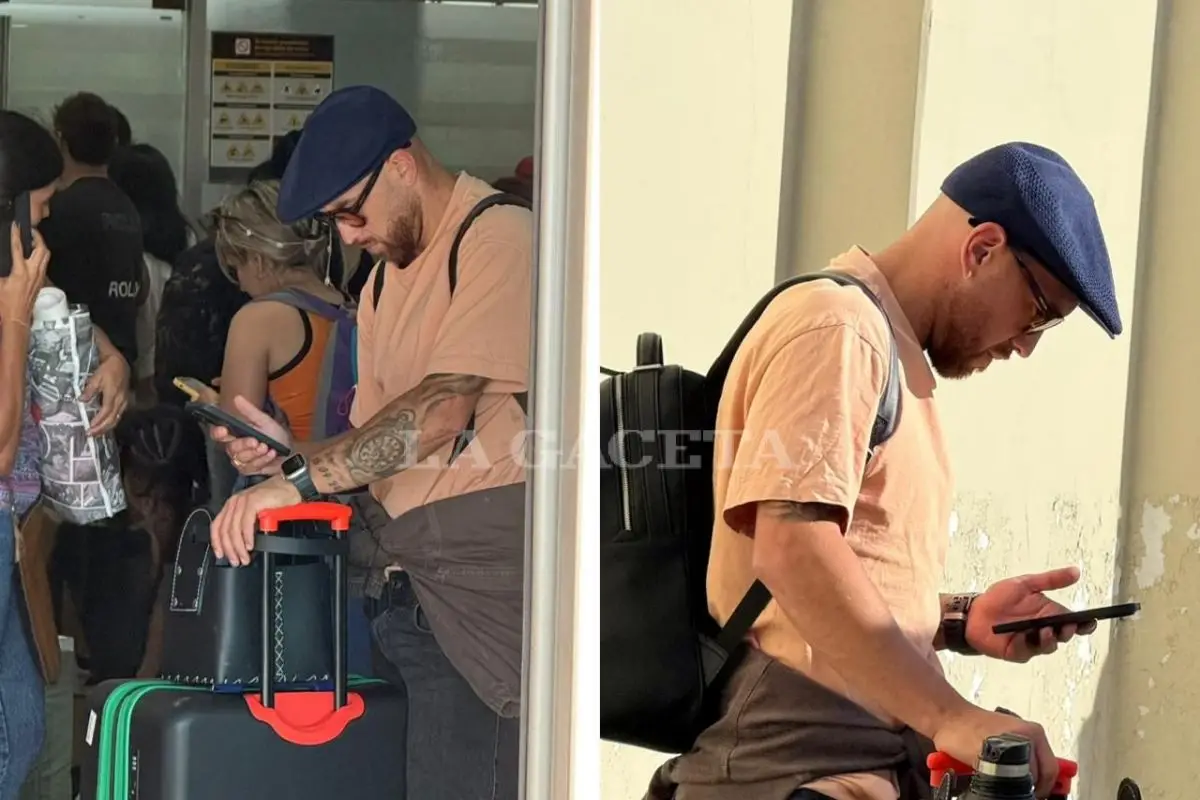 REGRESA AL SANTO. Junior Arias no despegó la mirada del smartphone, tras arribar a la provincia.