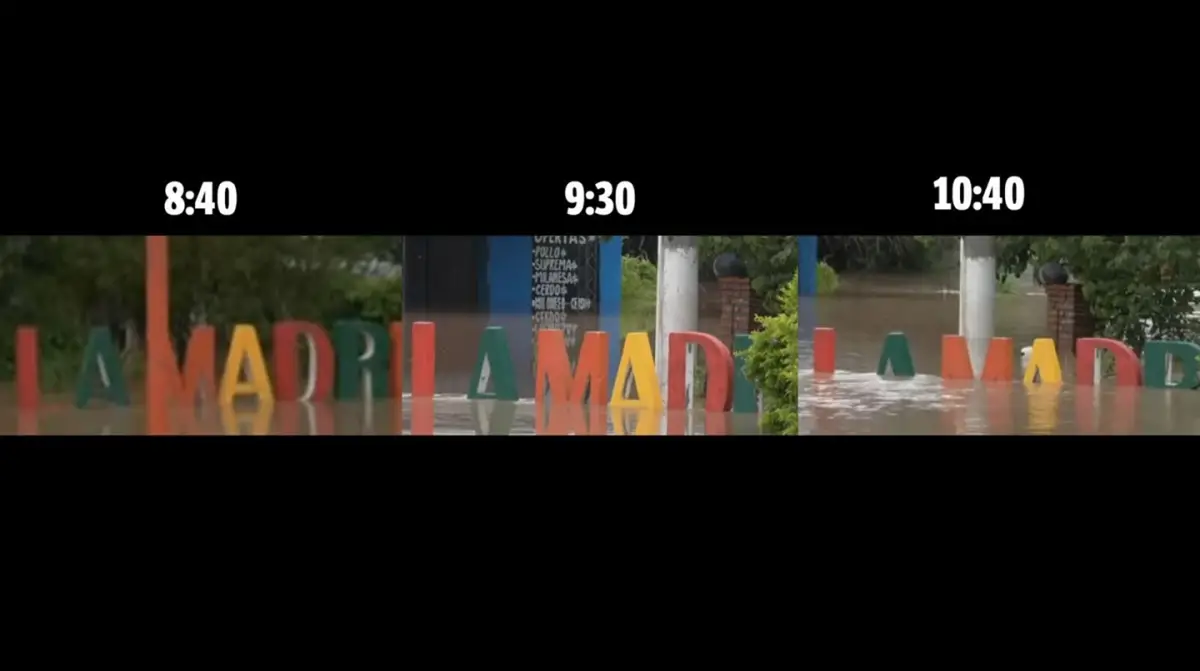 Un cartel de bienvenida revela el nivel de avance del agua en La Madrid. (Imagen LA GACETA)